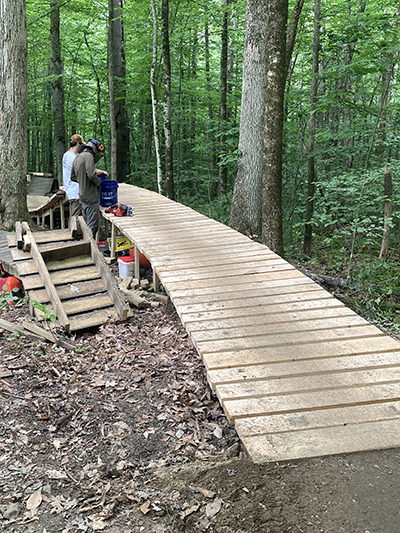 Fellowsip trail crew building a bridge
