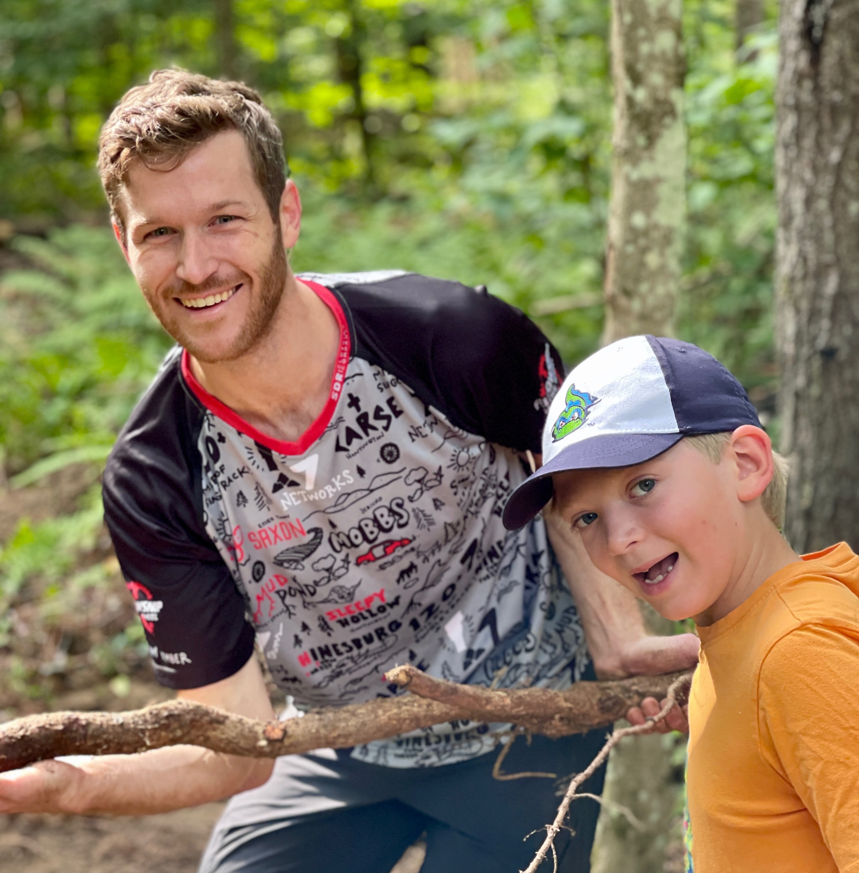 FOTW director Adam Morse with friend at a mountain bike event